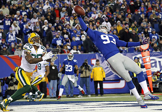 Chase Blackburn deflecting a pass in the end zone