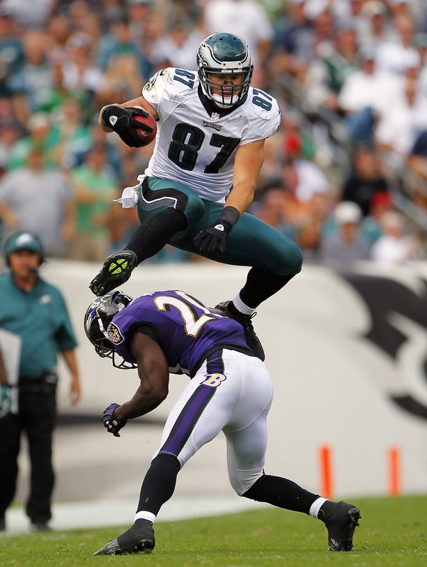 Eagles' tight end Brent Celek jumps over Ravens' safety Ed Reed