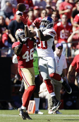 Prince Amukamara intercepts a pass from Alex Smith