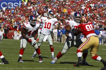 Eli Manning throwing the football